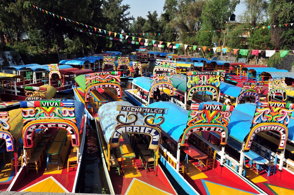 colorful boats of xochimilco in mexico city