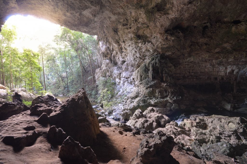 entrance of rio frio cave in belize as seen from inside the cave