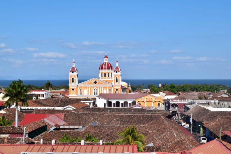 view of yellow and red church in granada nicaragua from above, an essential stop on a 2 weeks in nicaragua itinerary