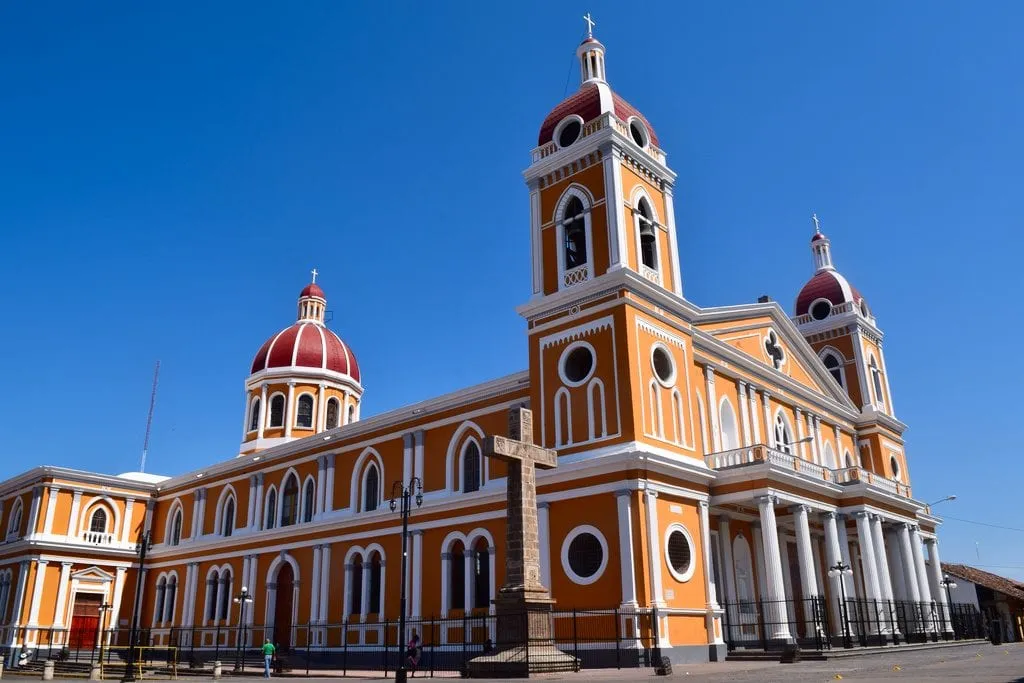 red and yellow church in granada nicaragua