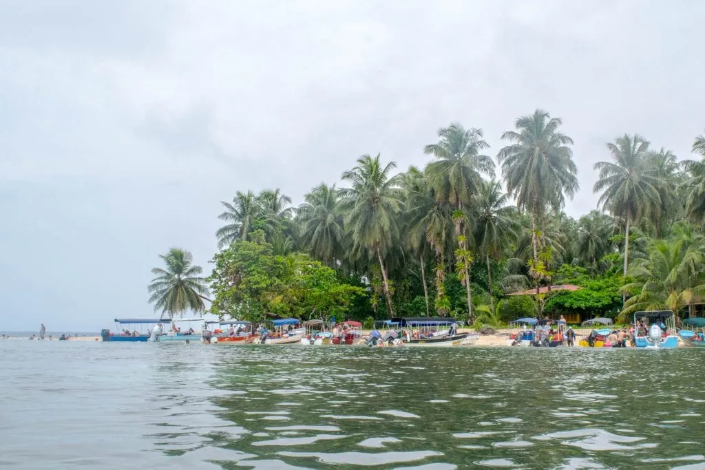 boats parked at a small island near bocas del toro panama on a rainy day