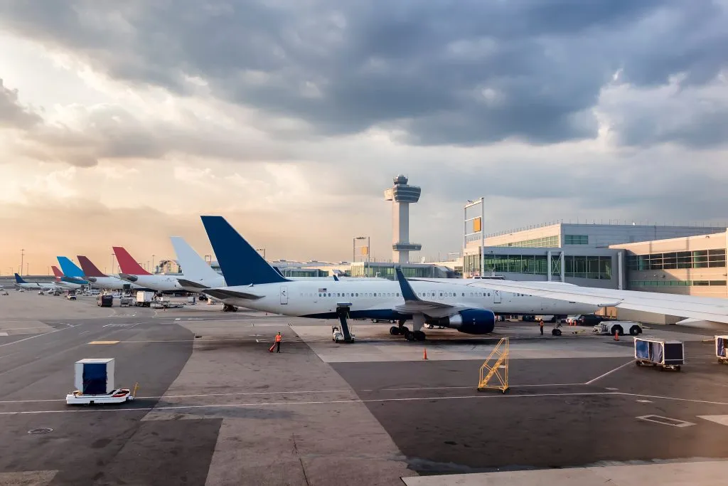 planes parked at gates at the airport