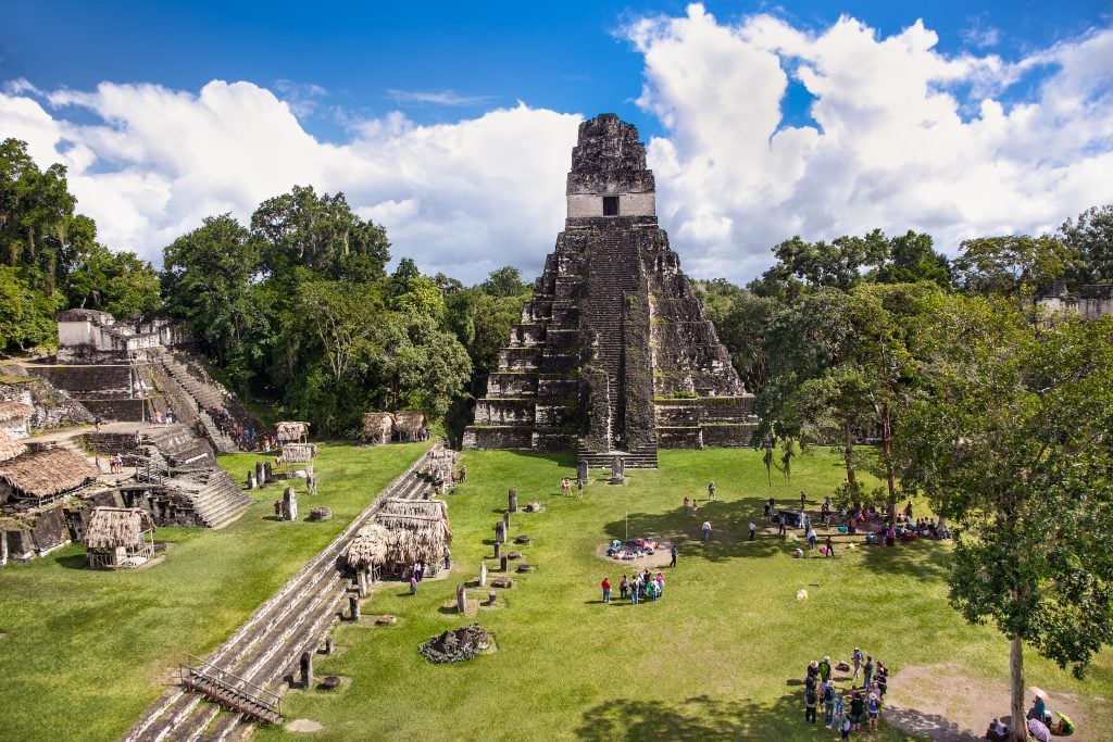 view of the gran plaza of tikal guatemala, an essential part of a 2 week guatemala itinerary
