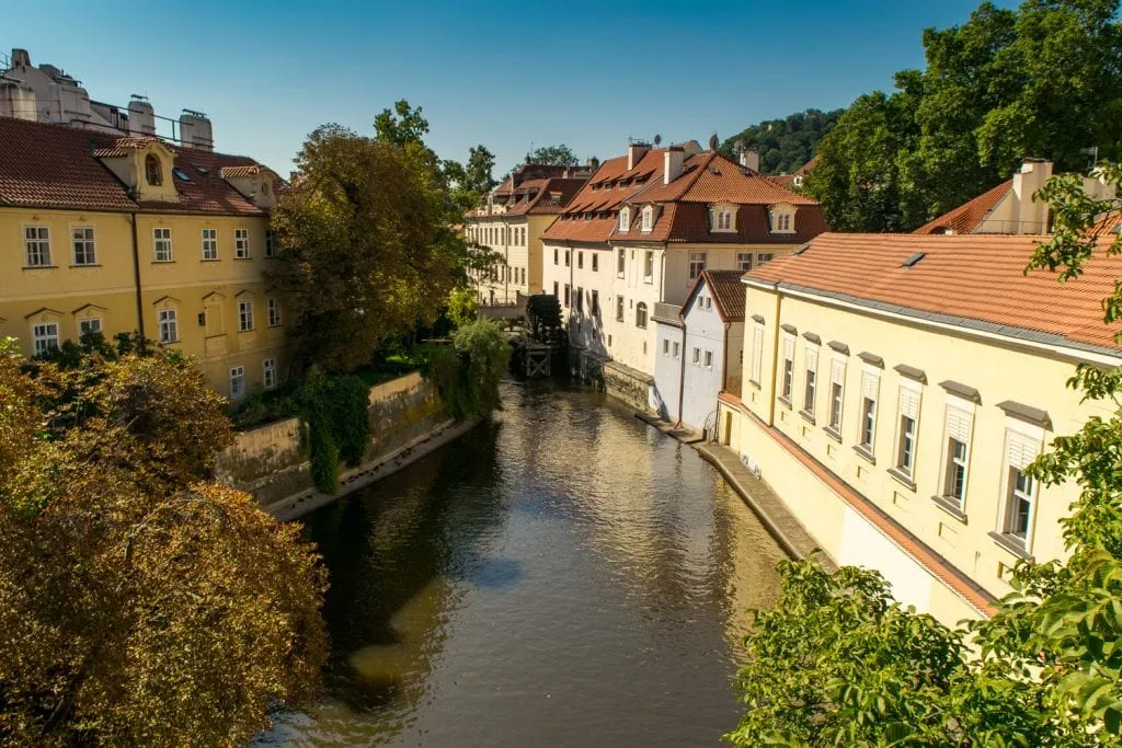 view of a small side street near charles bridge prague or budapest