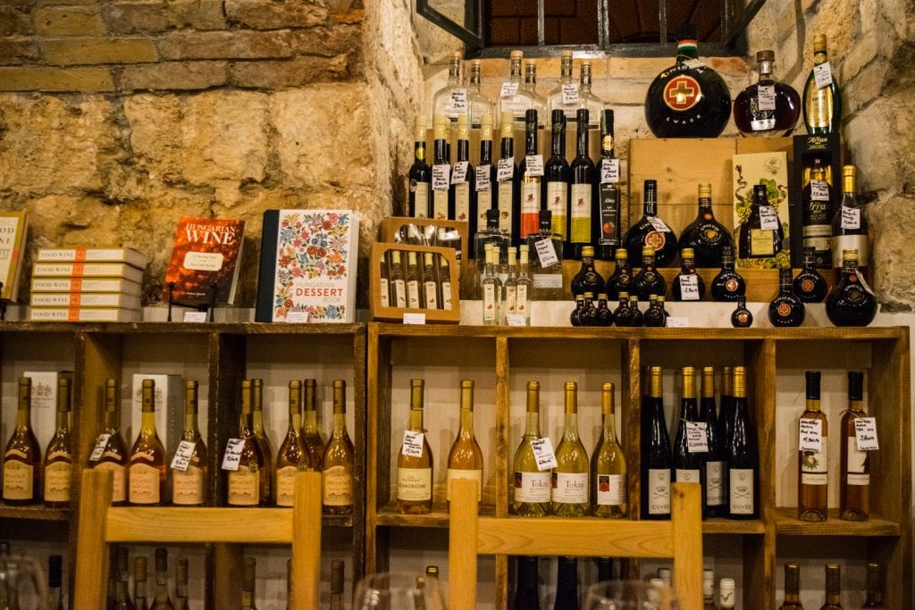 selection of wines on the shelf for sale at the tasting table in budapest hungary