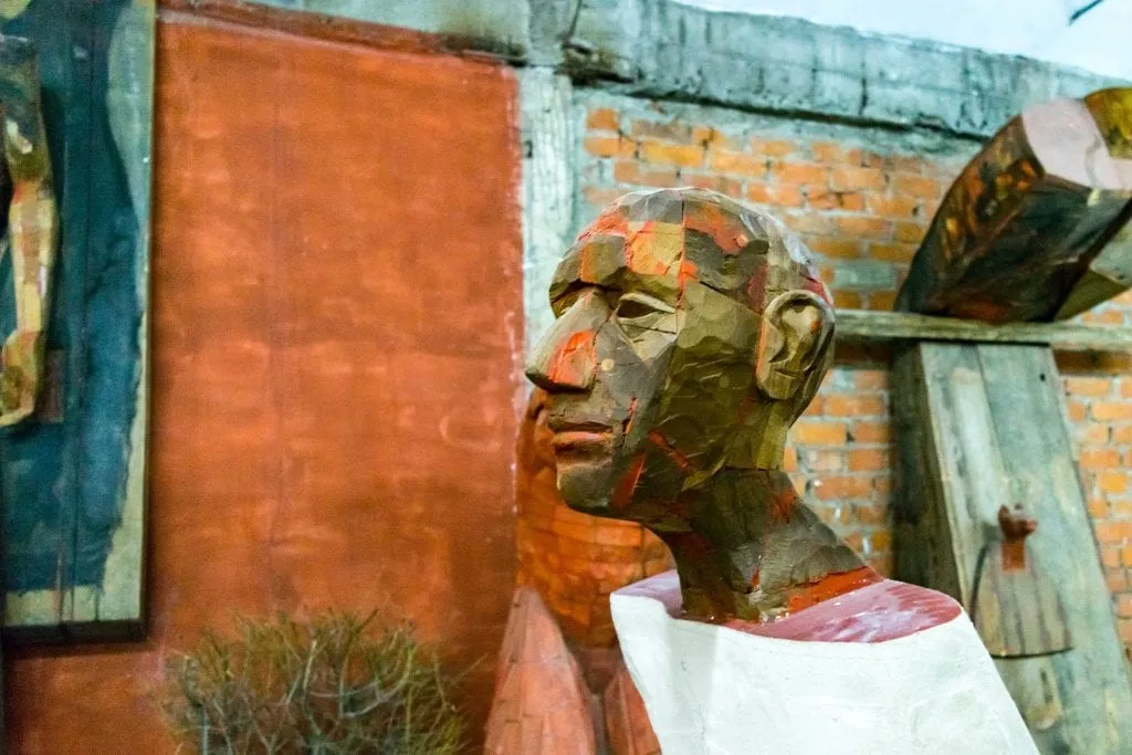 statue of a man in a gallery in bucharest, exploring the art scene belongs on any list of what to do in bucharest romania