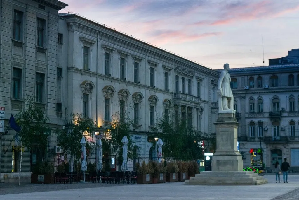 communist architecture at sunset, as seen during a walking tour, what to do in bucharest