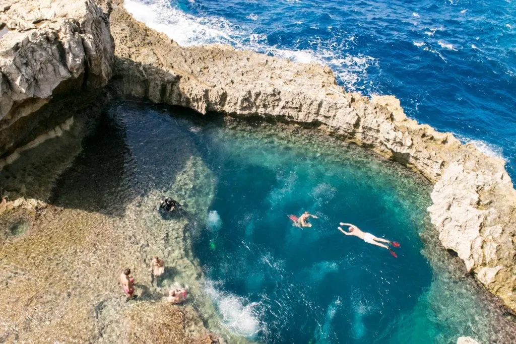 view of scuba divers and snorkelers in malta from above, one of the top things to do malta september