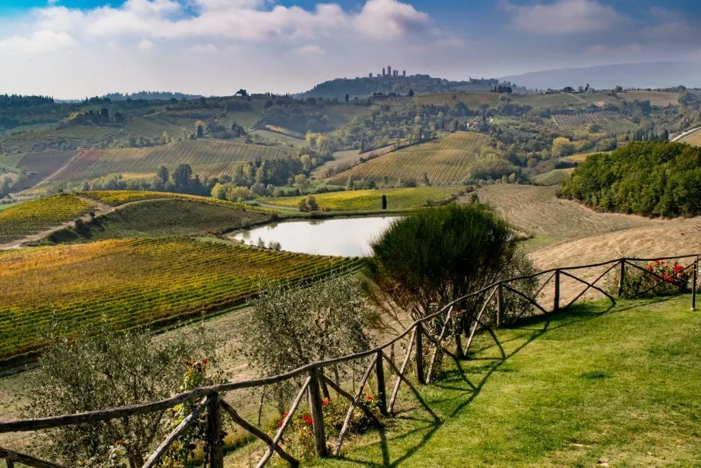 view of san gimignano from a tuscan winery, an italian bucket list worthy view