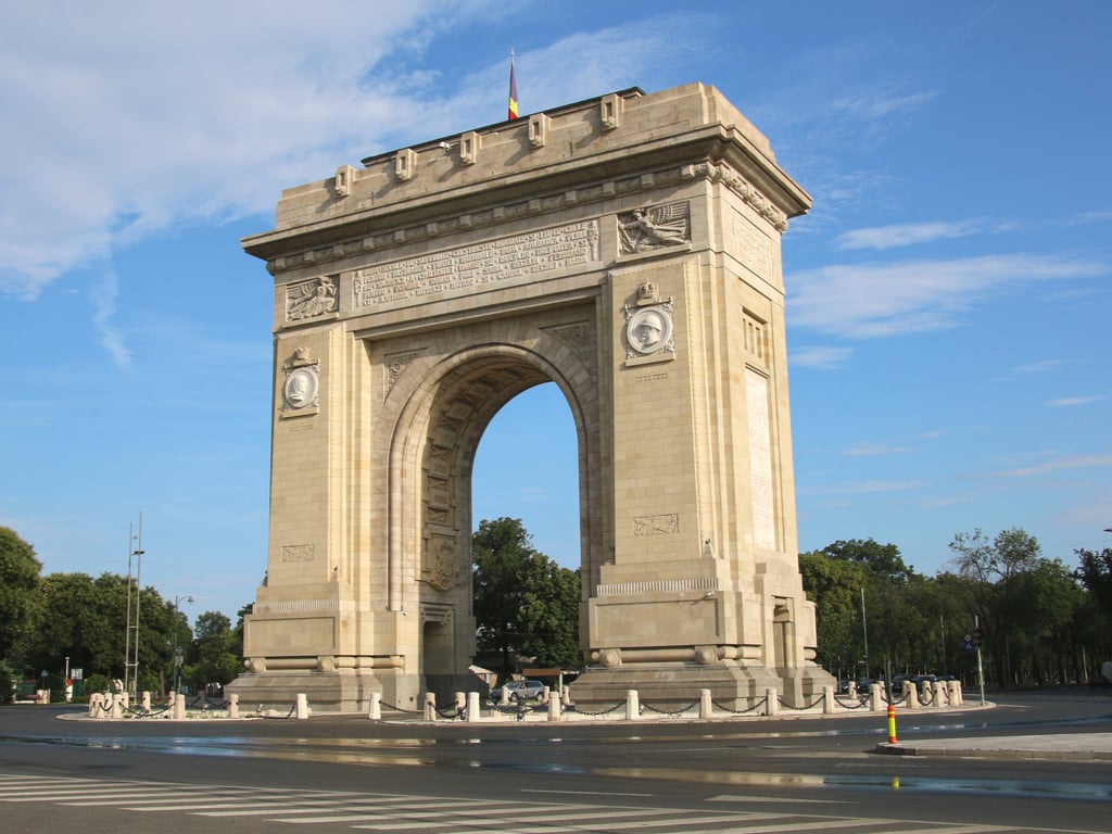 bucharest romania arch de triomphe on a sunny day, one of the best places to visit in bucharest in a day