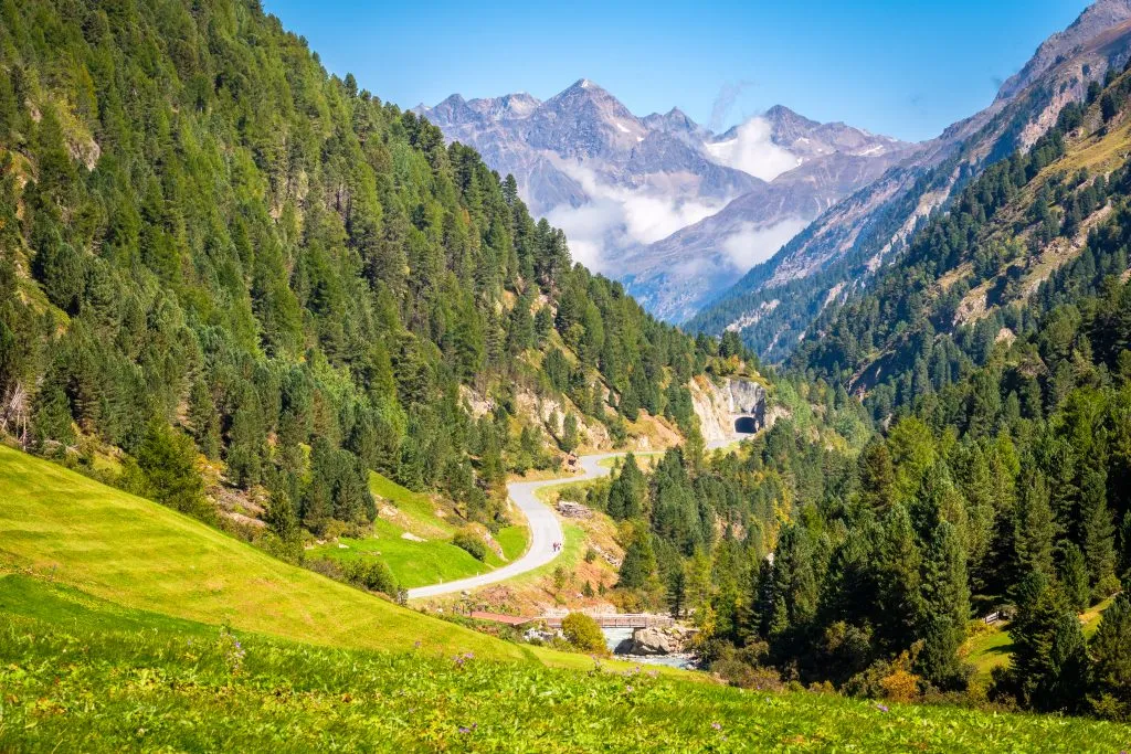 view of the mountains and curving road near vent austria, an offbeat europe destination