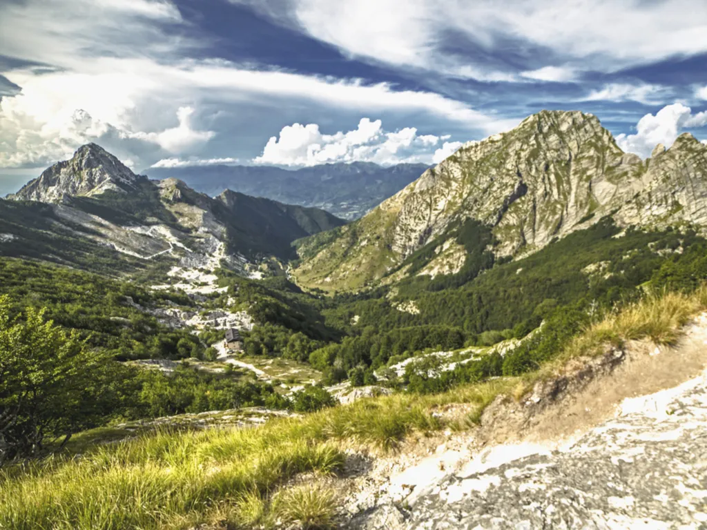 tuscany countryside of apuan alps, with peaks visible in the distance