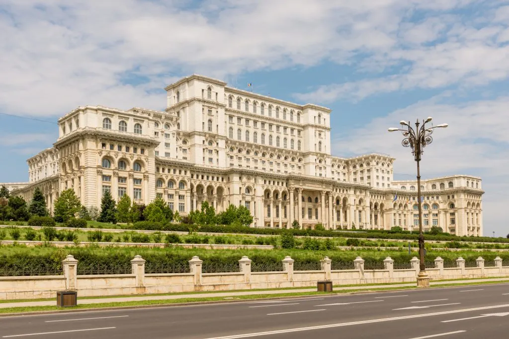 front facade of peoples house or parliament building in bucharest romania as seen from an angle