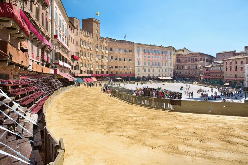 piazza del campo in siena being prepared for palio di siena with horse track laid out