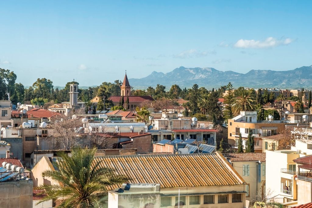 cityscape of nicosia cyprus with mountains visible in the background