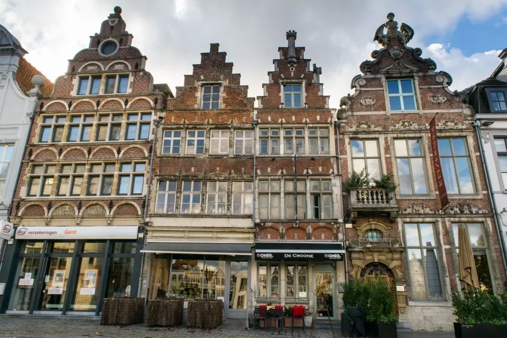 flanders style buildings in a square in ghent, architecture like this is common in either bruges or ghent