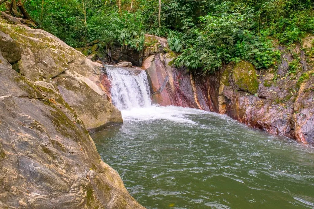 pool with small waterfall at pozo azul minca colombia waterfalls