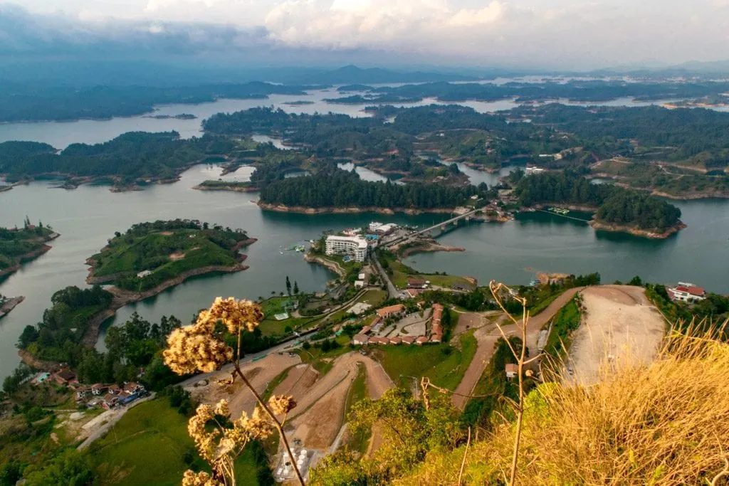 View from the top of El Penol in Colombia, with islands and lakes visible--getting to this view is a fabulous part of any 2 week Colombia itinerary.