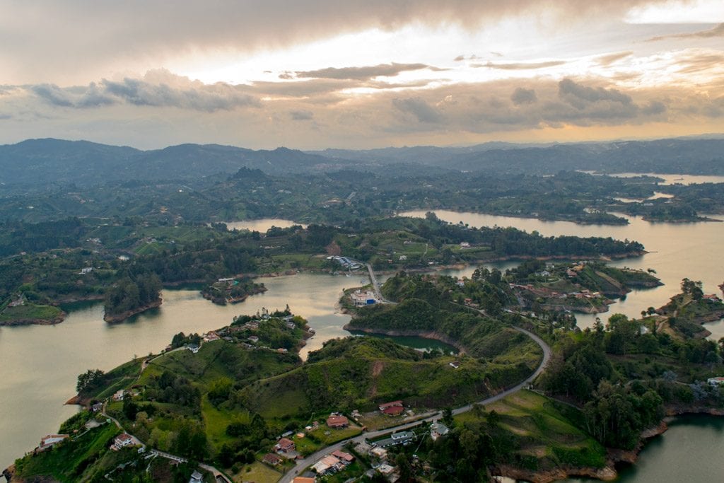 view of guatape colombia lake at sunset from above