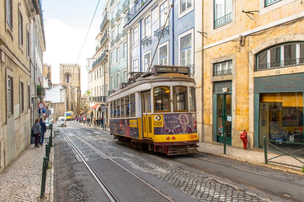 yellow tram car in lisbon alfama district, where our airbnb host was wonderful