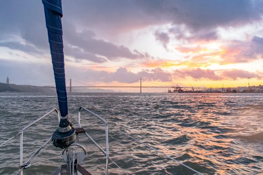 view of tagus river from a sailboat when visiting lisbon portugal