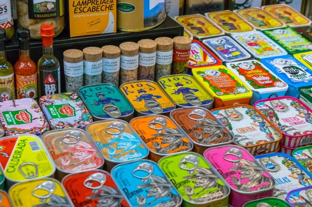 canned sardines as seen in a portuguese market, one of the best portugal souvenirs to buy