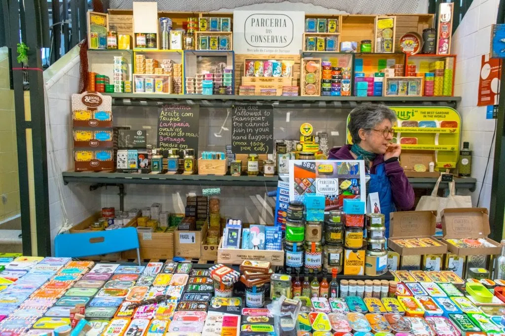 stall selling tinned sardines in campo de ourique market in lisbon
