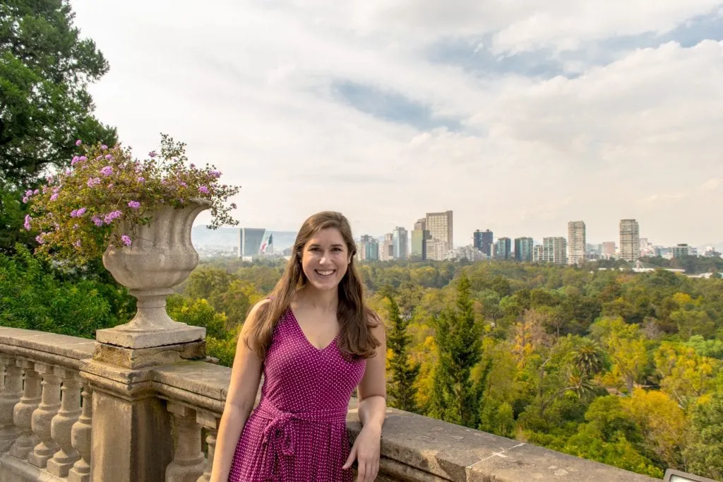 kate storm overlooking mexico city skyline from chapultepec park