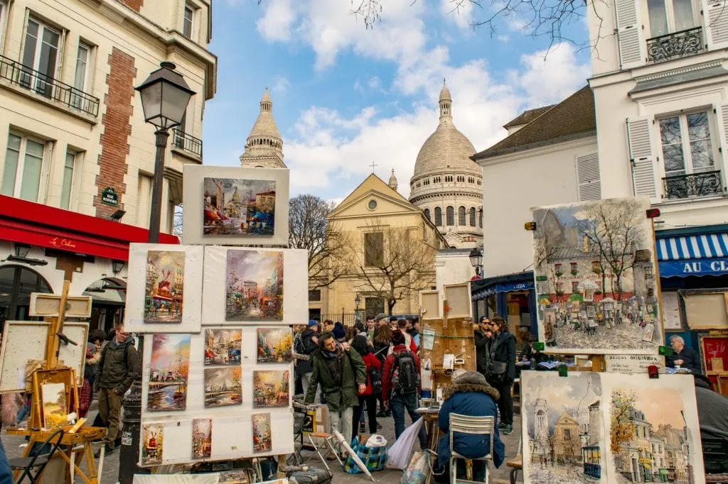 Place du Tertre in Montmartre, a fun place to stop during your 2 days in Paris weekend trip!