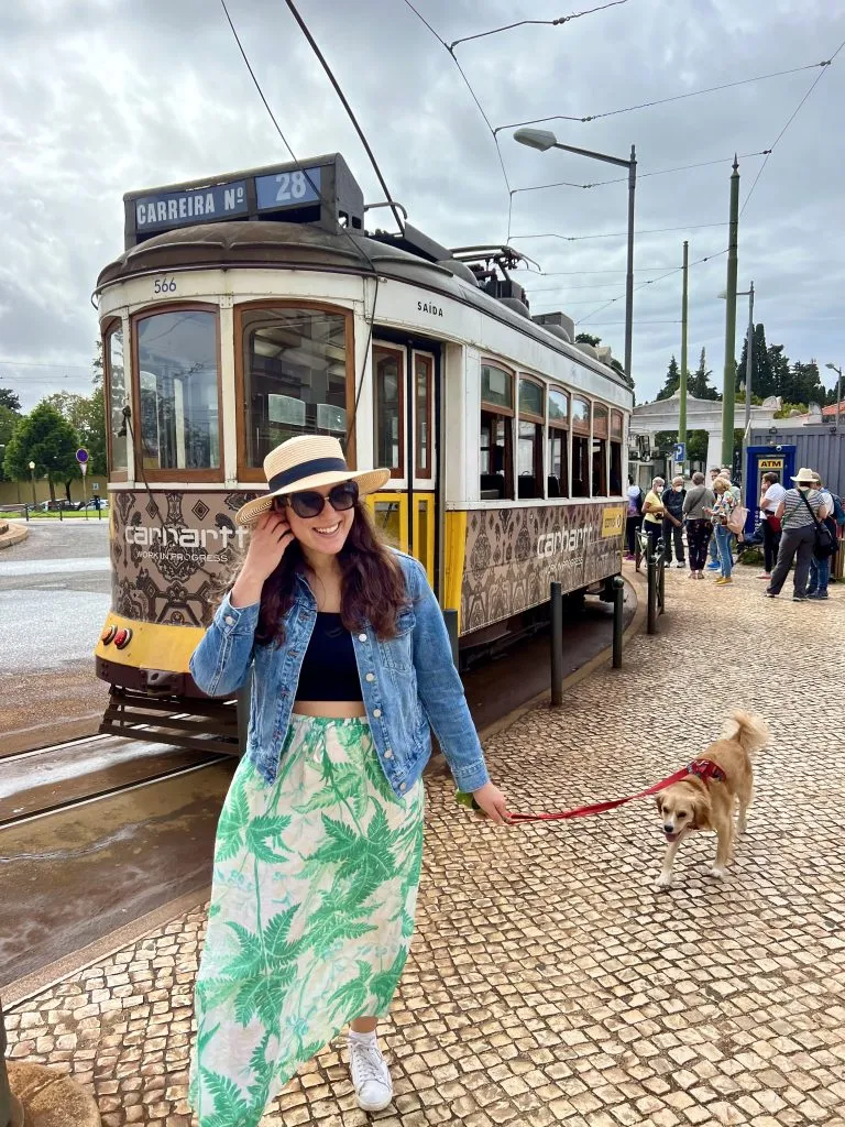 kate storm and ranger storm in front of tram 28 in campo de ourique lisbon neighborhood