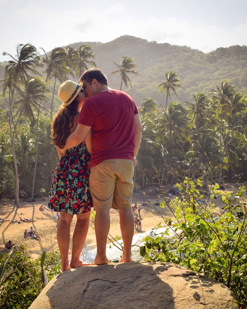 kate storm and jeremy storm posing in tayrona national park colombia vacation