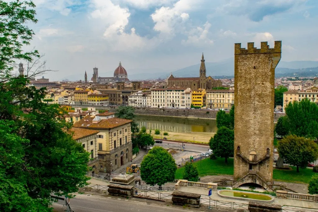 view of san niccolo tower in florence italy with duomo in the background