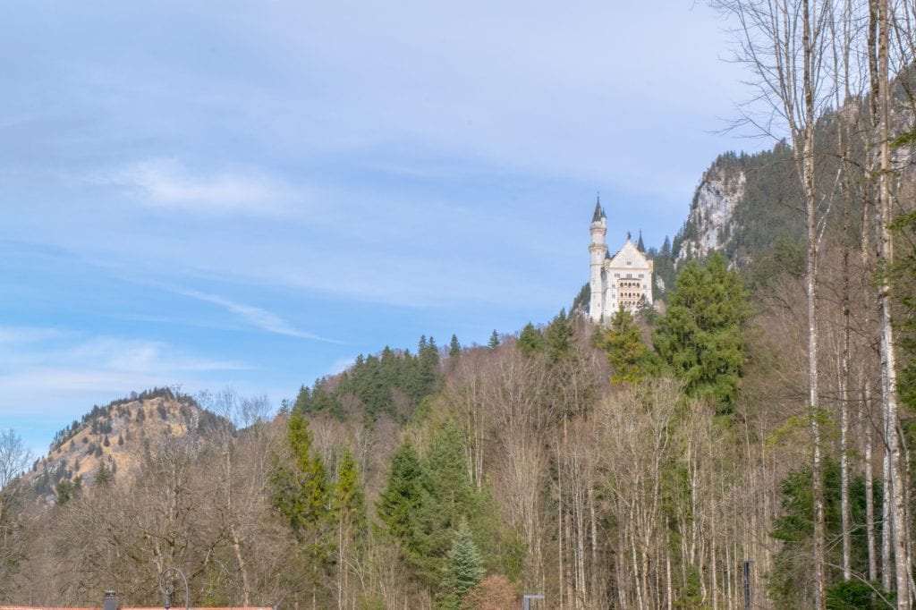 view of neuschwanstein castle when approaching from a distance