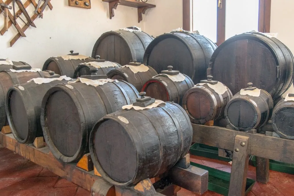 barrels of traditional balsamic vinegar in modena italy