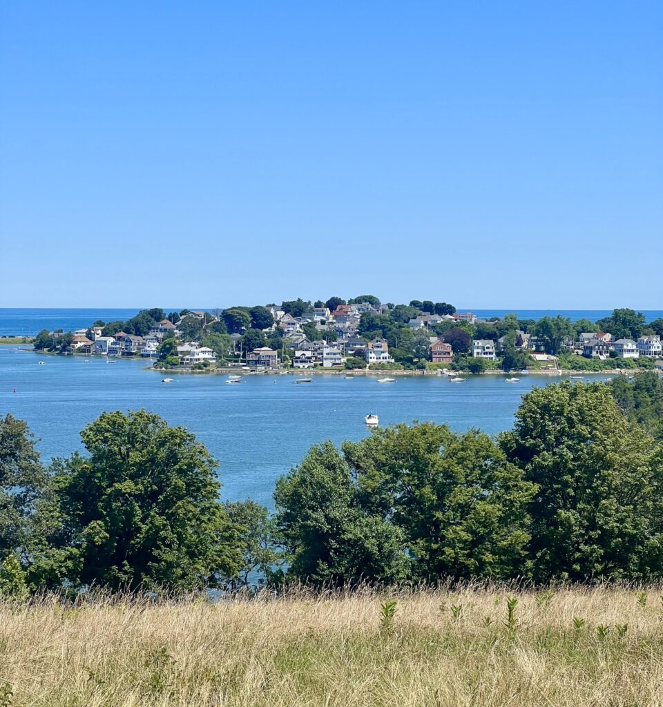 view of coastal water and town at worlds end in hingham ma, a great day trip from boston