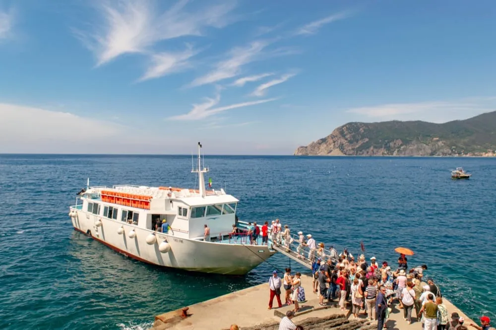 Visitors disembarking from a ferry in Vernazza, One Day in Cinque Terre