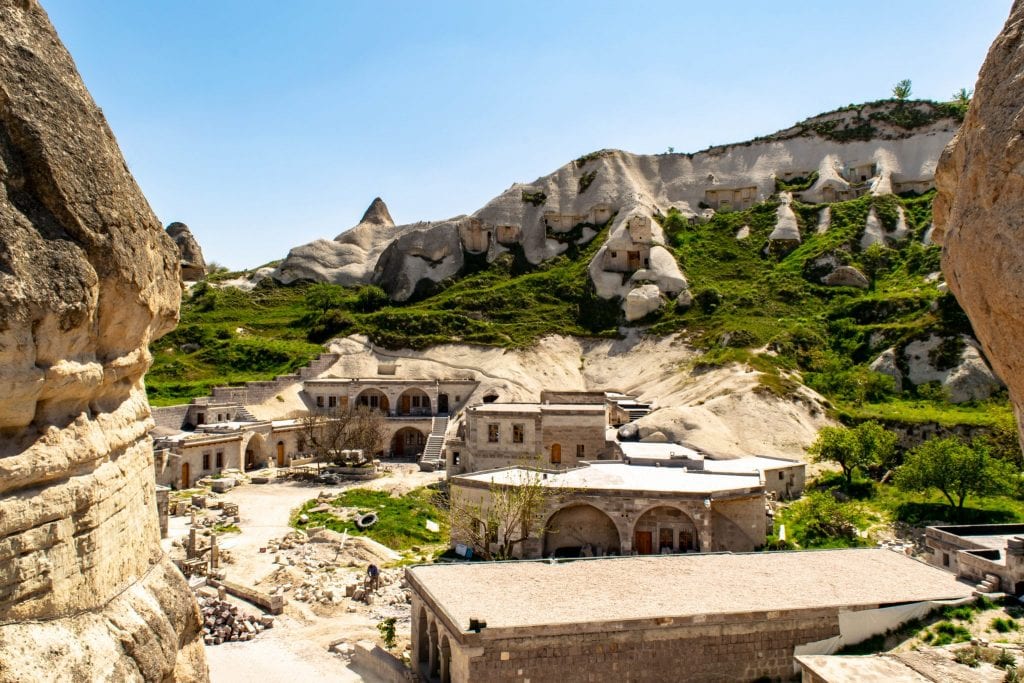 small village in cappadocia surrounded by rock formations