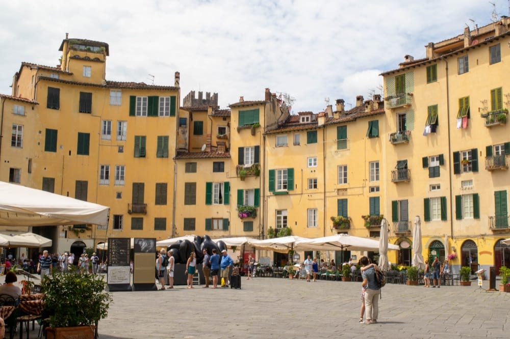 Part of the oval square in Lucca Italy, one of the essential stops on your Tuscany road trip itinerary