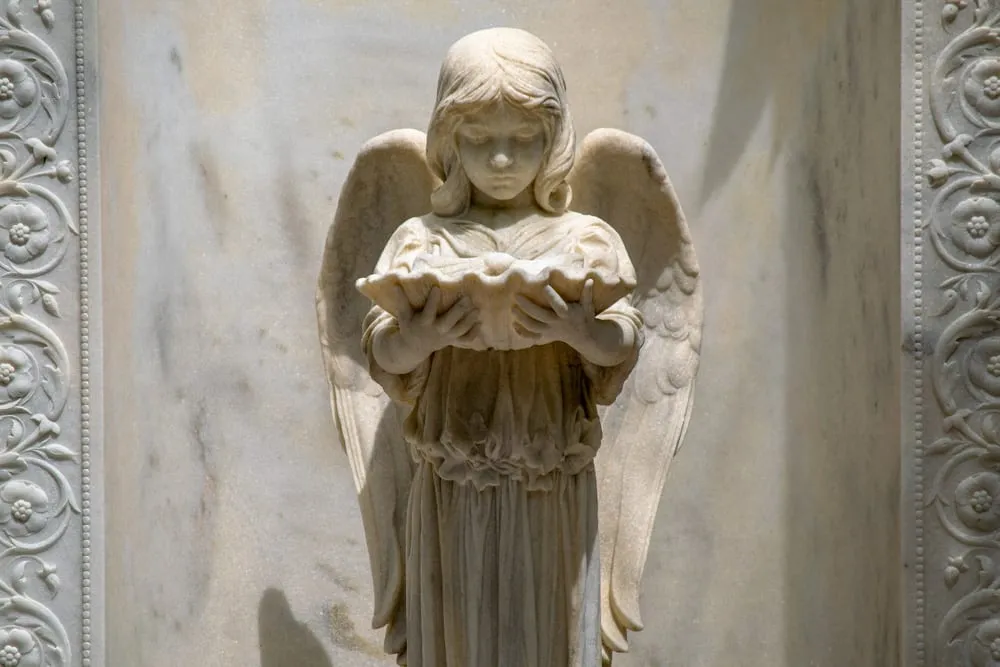 statue of a young girl in bonaventure cemetery savannah georgia