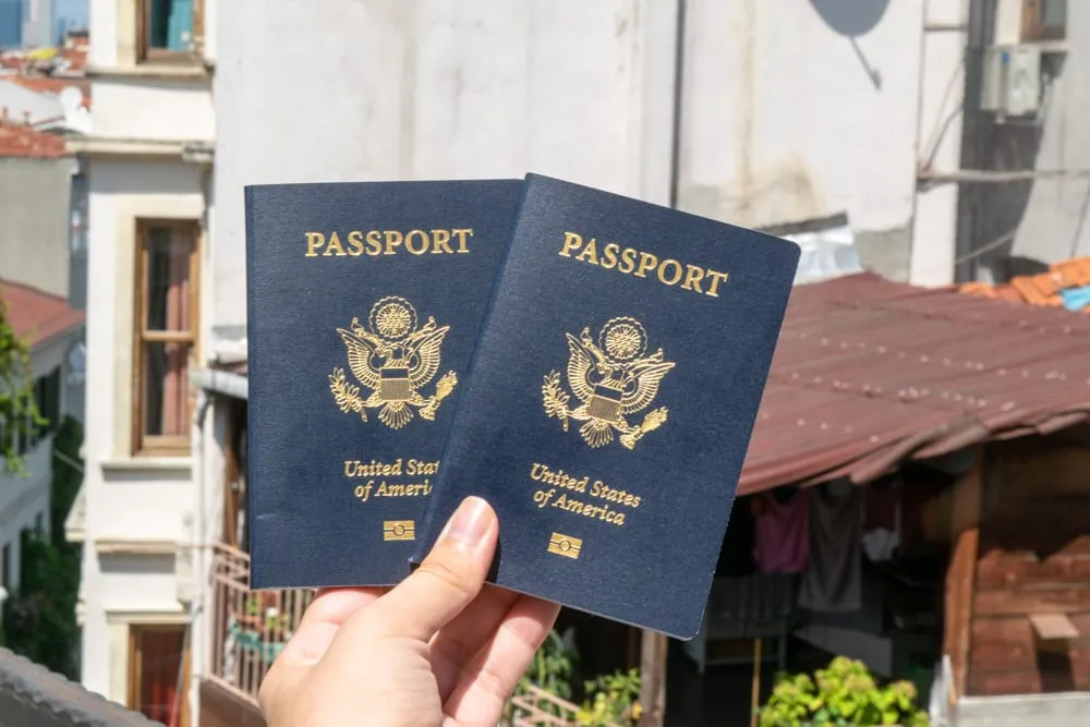 two us passports being held up in istanbul turkey. checking your passport expiration date is important for a travel checklist international