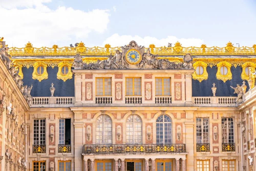 front facade of palace of versailles, a paris bucket list sightseeing destination