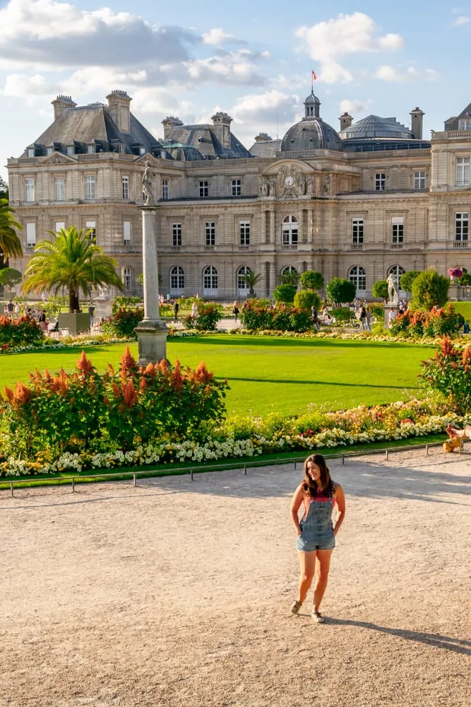 Kate Storm in the blooming Luxembourgh Gardens in August, one of the best places to take photos in Paris