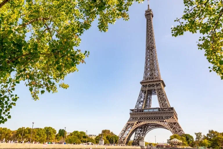 Eiffel Tower in Paris France as framed by trees