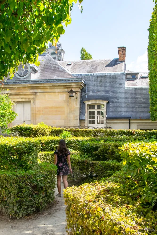 Visiting Versailles from Paris: Girl near Petit Trianon