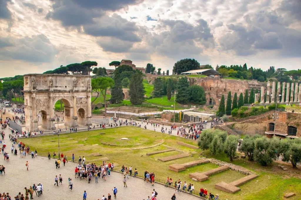 view of triumphal arch as seen looking out from the colosseum on an itinerary for rome in 4 days