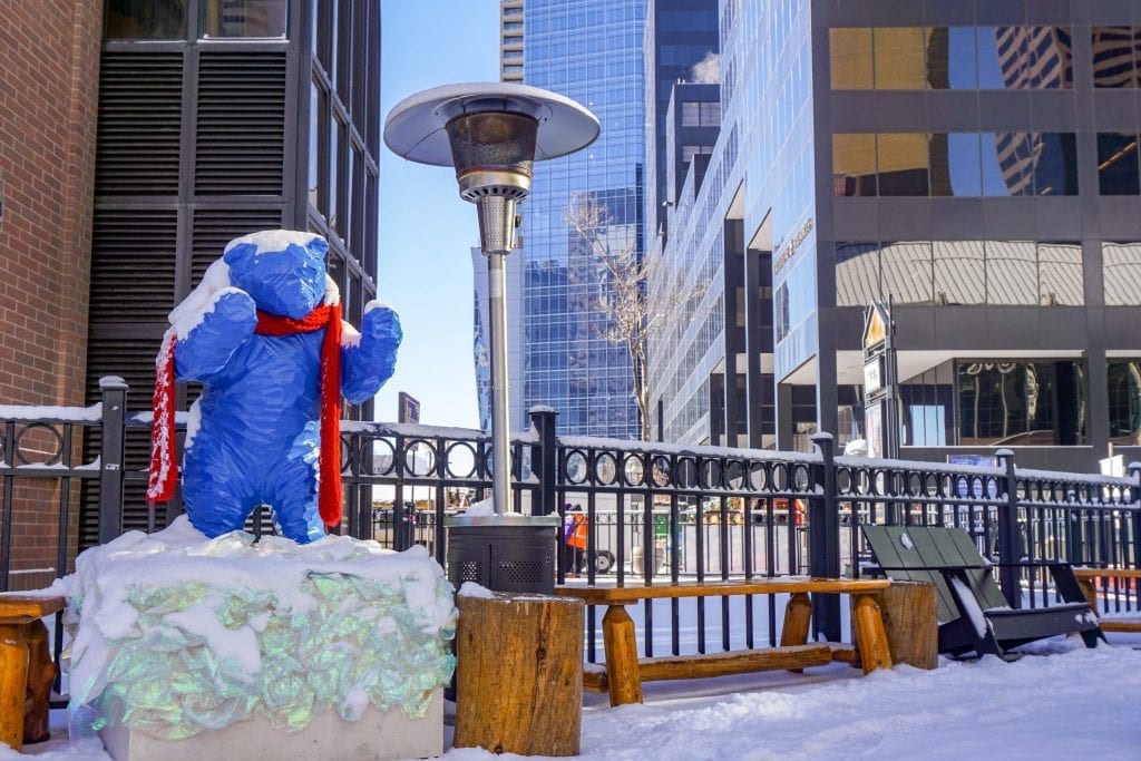 snowy denver street in winter, denver is one of the most romantic trips in america for couples