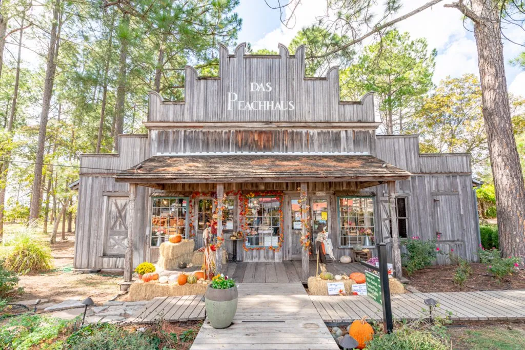 front facade of das peach haus in fredericksburg tx, one of the most romantic trips for couples in usa