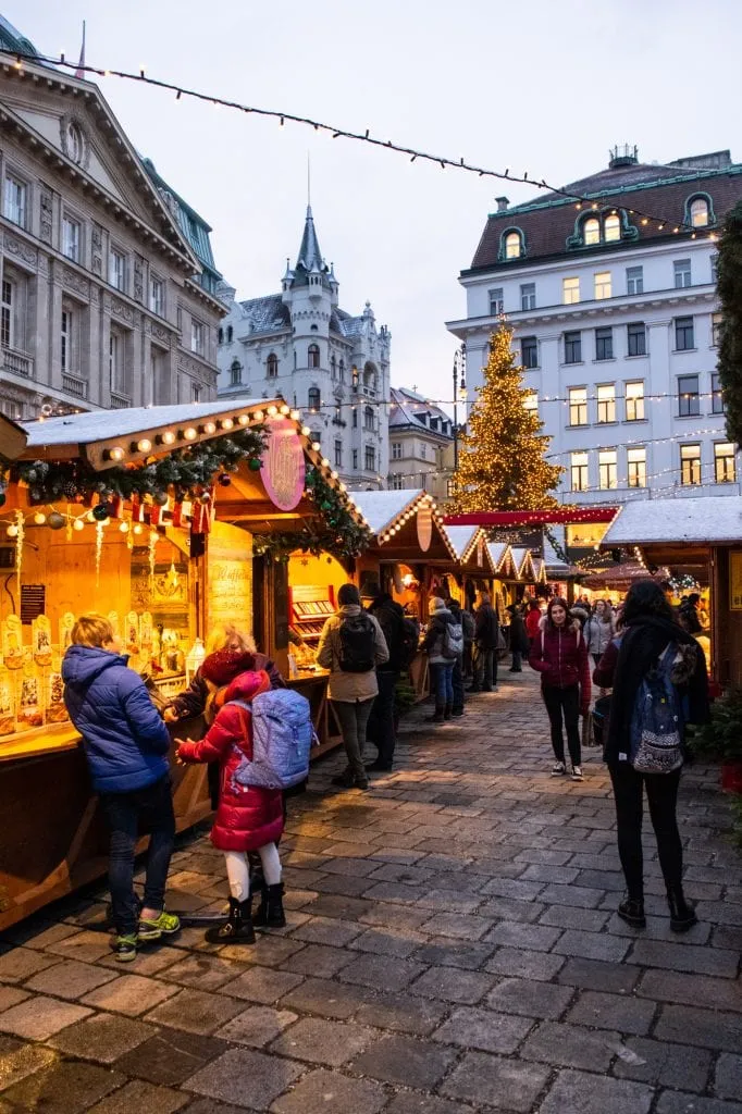 people shopping at a vienna austria christmas market