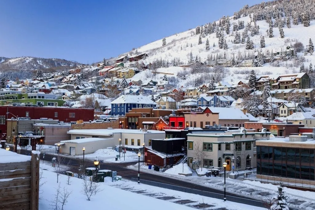 Park City Utah old town from above shot in winter, with snow covering the town. This is the perfect winter romantic getaway in USA