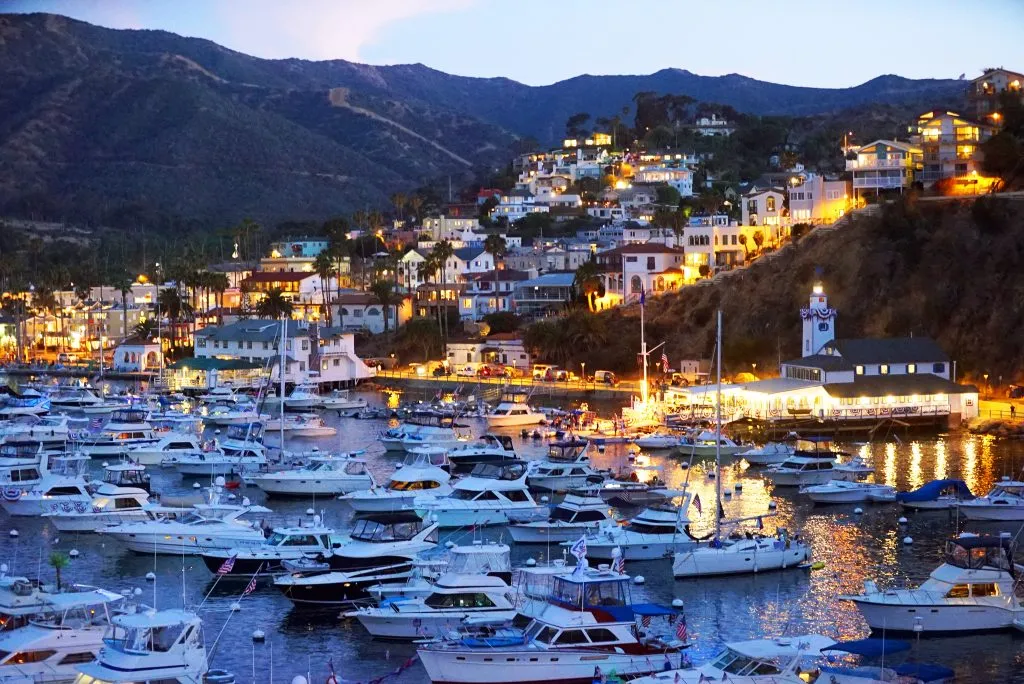 sunset at avalon harbor in catalina island california, one of the best places to visit in america for couples